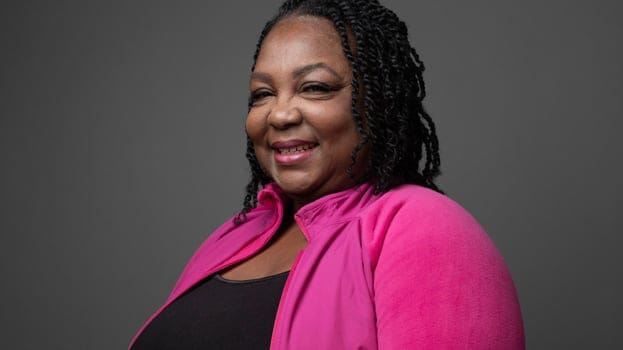 African American Woman Pink Shirt