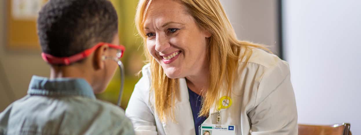 Doctor examines child