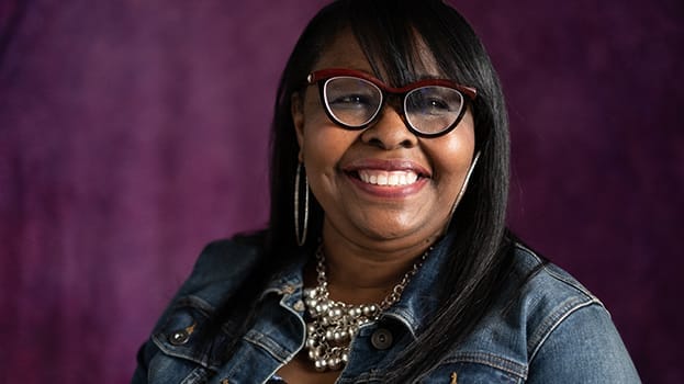 Smiling woman wearing glasses